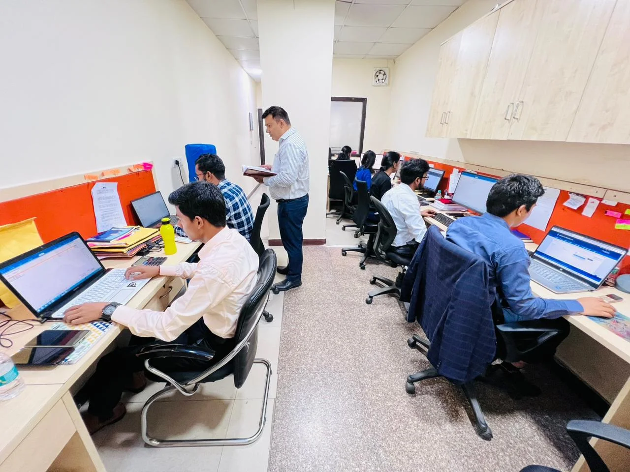 Professional CA team working in office